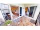 Tiled patio with access to living room and bedroom at 3600 Bal Harbor Blvd # 1-O, Punta Gorda, FL 33950