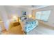 Bright bedroom with a king-size bed and access to a private bathroom at 3600 Bal Harbor Blvd # 1-O, Punta Gorda, FL 33950