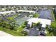 Aerial view showing building location, tennis court, and parking at 3600 Bal Harbor Blvd # 1-O, Punta Gorda, FL 33950
