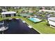 Aerial view of condo, highlighting pool and tennis court at 3600 Bal Harbor Blvd # 1-O, Punta Gorda, FL 33950