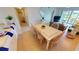 Light and airy dining area with tile-top table and six chairs at 3600 Bal Harbor Blvd # 1-O, Punta Gorda, FL 33950