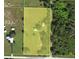 Aerial view of property showing house and surrounding land at 31840 Washington Loop Rd, Punta Gorda, FL 33982