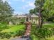 House exterior, showcasing landscaping at 6242 Tropicaire Blvd, North Port, FL 34291