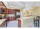 Well-equipped kitchen featuring wood cabinets and stainless steel appliances at 3311 Wood Thrush Dr # 113, Punta Gorda, FL 33950