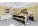 Spacious main bedroom with a king-size bed and ample dresser space at 3311 Wood Thrush Dr # 113, Punta Gorda, FL 33950