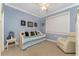 Charming bedroom with daybed, window seating, and ceiling fan at 3311 Wood Thrush Dr # 113, Punta Gorda, FL 33950