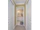 Elegant bathroom with double vanity, large mirror, and a walk-in shower at 3311 Wood Thrush Dr # 113, Punta Gorda, FL 33950