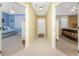 Bright hallway with access to bedrooms and updated flooring at 3311 Wood Thrush Dr # 113, Punta Gorda, FL 33950