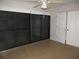 Sunroom with tile floors, sliding glass doors and ceiling fan at 601 Shreve St # 12B, Punta Gorda, FL 33950