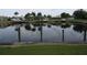 Tranquil canal view with reflection of houses and boats at 601 Shreve St # 12B, Punta Gorda, FL 33950