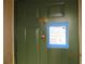 Condo building's front door with a no trespassing sign at 601 Shreve St # 12B, Punta Gorda, FL 33950