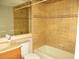 Bathroom with tub, shower, and wood vanity at 601 Shreve St # 12B, Punta Gorda, FL 33950