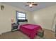 Bedroom with a full-size bed and window seat at 25499 Taltal Dr, Punta Gorda, FL 33983