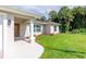 Charming single-Gathering home with a well-manicured lawn and inviting front porch at 3159 Draper Ter, North Port, FL 34286