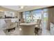 Bright sitting area with water views and comfortable armchairs at 1250 W Marion Ave # 242, Punta Gorda, FL 33950