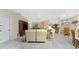 Spacious living room with comfortable seating and dining area at 1250 W Marion Ave # 242, Punta Gorda, FL 33950