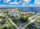 Condo building with water access and tennis courts at 1250 W Marion Ave # 242, Punta Gorda, FL 33950