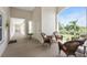Relaxing balcony with wicker furniture offering scenic views at 1250 W Marion Ave # 242, Punta Gorda, FL 33950