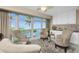 Cozy sitting area with water views and comfortable chairs at 1250 W Marion Ave # 242, Punta Gorda, FL 33950