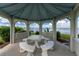 Waterfront gazebo with seating, perfect for enjoying the view at 1250 W Marion Ave # 242, Punta Gorda, FL 33950