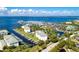 Aerial view of waterfront community with marina, boat slips, and parking at 1250 W Marion Ave # 242, Punta Gorda, FL 33950