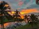 Stunning sunset over the water from a waterfront property at 1250 W Marion Ave # 242, Punta Gorda, FL 33950