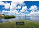 Enjoy the peaceful waterfront view from this bench at 1250 W Marion Ave # 242, Punta Gorda, FL 33950