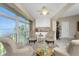 Bright sitting area with water views and comfy chairs at 1250 W Marion Ave # 242, Punta Gorda, FL 33950