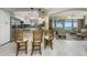 Open kitchen with breakfast bar, granite counters, and water views at 1250 W Marion Ave # 242, Punta Gorda, FL 33950