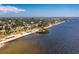 Aerial view of waterfront with walkway and bridge at 1250 W Marion Ave # 242, Punta Gorda, FL 33950