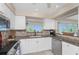 Modern kitchen with stainless steel appliances and granite countertops at 1250 W Marion Ave # 242, Punta Gorda, FL 33950