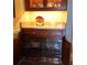 Kitchen cabinets with pull-out shelves for plates and dishes at 24395 Suncoast Blvd, Punta Gorda, FL 33980