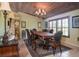 Formal dining room with wood table and chairs, and wood ceiling at 24395 Suncoast Blvd, Punta Gorda, FL 33980