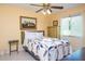 Cozy bedroom with queen-size bed and built-in dresser at 24395 Suncoast Blvd, Punta Gorda, FL 33980