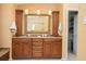 Double vanity bathroom with granite countertops and ample storage at 24395 Suncoast Blvd, Punta Gorda, FL 33980