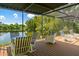Relaxing screened patio overlooking a serene lake at 24395 Suncoast Blvd, Punta Gorda, FL 33980