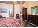 Main bedroom with a four-poster bed and ample closet space at 24395 Suncoast Blvd, Punta Gorda, FL 33980