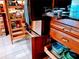 Well-designed kitchen pantry with pull-out shelving at 24395 Suncoast Blvd, Punta Gorda, FL 33980