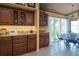 Spacious kitchen with wood cabinets, granite counters, and a breakfast nook at 24395 Suncoast Blvd, Punta Gorda, FL 33980