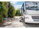 Spacious RV pad with convenient access and lush landscaping at 24395 Suncoast Blvd, Punta Gorda, FL 33980