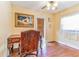 Cozy home office with wooden desk and plenty of natural light at 24395 Suncoast Blvd, Punta Gorda, FL 33980