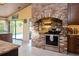 Kitchen with stainless steel appliances and a brick oven range at 24395 Suncoast Blvd, Punta Gorda, FL 33980