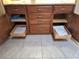 Well-organized kitchen cabinets with pull-out drawers at 24395 Suncoast Blvd, Punta Gorda, FL 33980