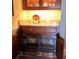 Kitchen cabinets with pull-out shelves for plates and dishes at 24395 Suncoast Blvd, Punta Gorda, FL 33980