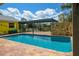 Refreshing pool with terracotta tile decking and a relaxing patio at 24395 Suncoast Blvd, Punta Gorda, FL 33980