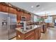 Modern kitchen with stainless steel appliances and granite countertops at 24588 Buckingham Way, Port Charlotte, FL 33980