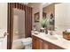 Guest bathroom with tub/shower combo and vanity at 24588 Buckingham Way, Port Charlotte, FL 33980