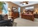 Main bedroom with a king-size bed and ample closet space at 24588 Buckingham Way, Port Charlotte, FL 33980