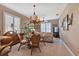 Casual dining area with a view of the living room at 24588 Buckingham Way, Port Charlotte, FL 33980