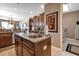 Island kitchen with granite countertops and ample storage at 24588 Buckingham Way, Port Charlotte, FL 33980